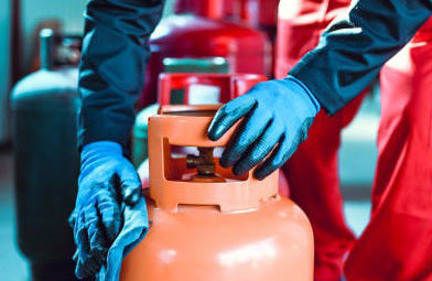 Man Cleaning Cylinder